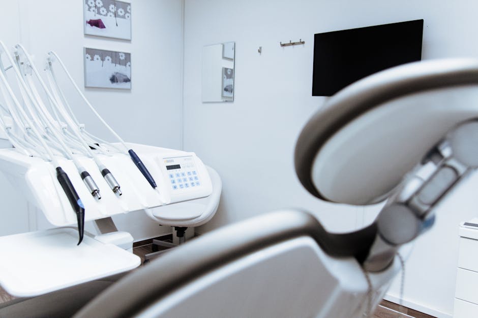 pexels-photo-305568-305568 Bright dental office showcasing modern equipment and clean, sleek design.